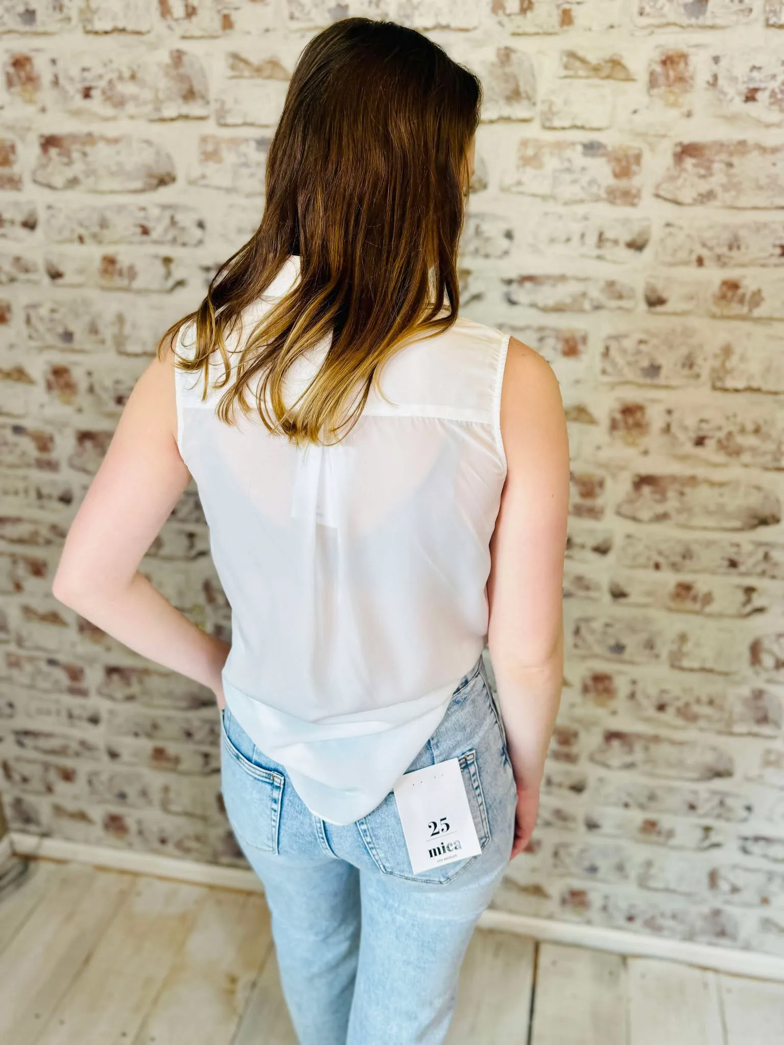 Sleeveless Surplice Blouse