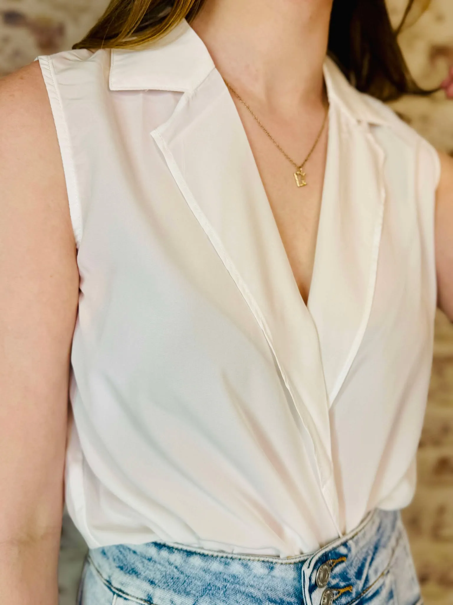 Sleeveless Surplice Blouse
